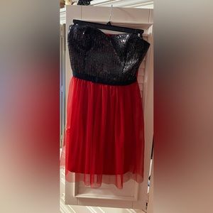Sparkly black, gold, and red strapless dress